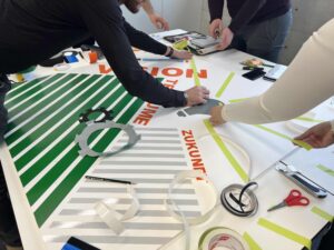 Impressionen des Tape Art Teambuilding Workshops bei der Firma Weisenburger – DUMBO AND GERALD